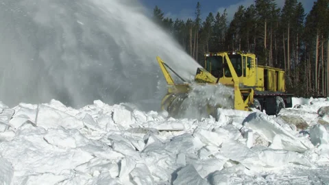 Snow Blower Spring Plowing Through Mountain Forest Stock Footage 130225314