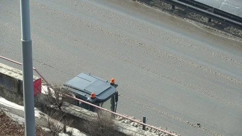 Snow blower, tractor cleans snow on the road Stock Footage 125457211