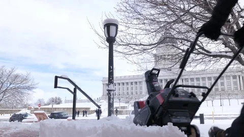 Snow Blower Utah Capitol In The Background Medium, Daytime Stock Footage 86752859