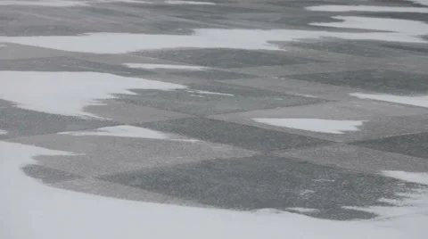Snow blowing and drifting across a  stone tiles 動画素材 45586360
