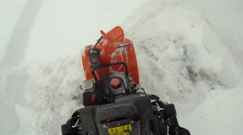 Snow blowing driveway - point of view Stock Footage 47008334
