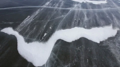 Snow blowing on ice Stock Footage 37217194