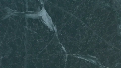Snow blowing over thick ice 2 Stock Footage 240905578