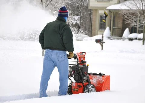 Snow blowing Stock Photos