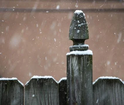 Snow Blowing by the Post During the Day Stock Photos