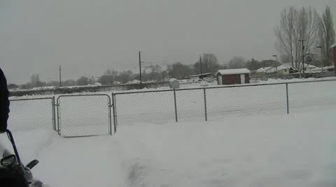 Snow blowing sidewalk Stock Footage 18172210