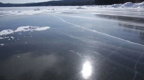 Snow blowing on smooth ice Stock Footage 37217360