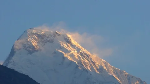Snow blowing off the top of a massive mountain. Nepal 스톡 동영상 91770104