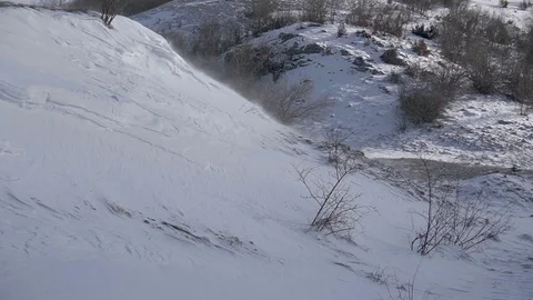 Snow Blown by the Wind in the Mountains Stock Footage 96379829