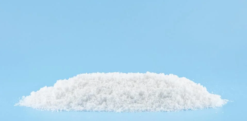 Snow on a blue background Stock Photos