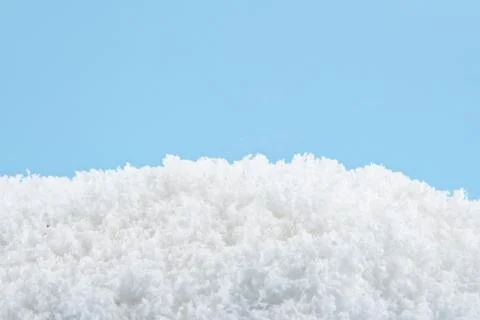 Snow on a blue background Stock Photos