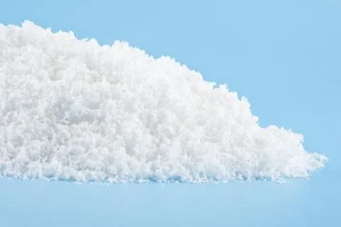 Snow on a blue background Stock Photos