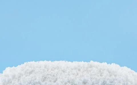 Snow on a blue background Stock Photos