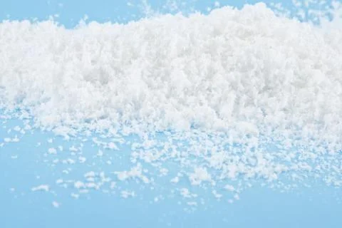 Snow on a blue background Stock Photos
