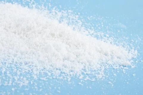 Snow on a blue background Stock Photos