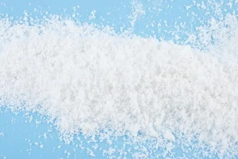 Snow on a blue background Stock Photos
