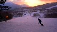 Snow Boarder Racing Past Into Beautiful Sunset Stock Footage