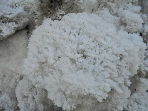 Snow boulder with ice crystal structure on the surface. Fotos de archivo