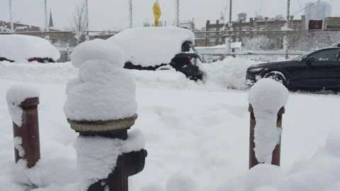Snow-Buried Fire Hydrant and Buried Cars, Brooklyn Parking Lot Stock Footage 329888696