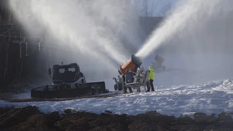 The snow cannon makes artificial snow on the slope. Winter sports Stock-Footage 97794006