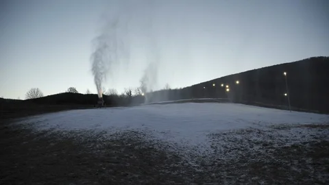 The snow cannon makes artificial snow on the slope. Winter sports 스톡 동영상 97796718