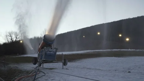The snow cannon makes artificial snow on the slope. Winter sports Vídeo Stock 97796781