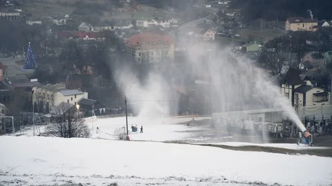 The snow cannon makes artificial snow on the slope. Winter sports Vídeo Stock 97796854