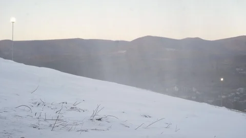 The snow cannon makes artificial snow on the slope. Winter sports Vídeo Stock 97797128