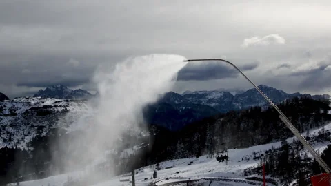 Snow cannon is making artificial snow in popular ski resort Nassfeld, Austria. 動画素材 141226756