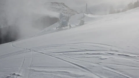 A snow cannon is making artificial snow Stock Footage 141226796