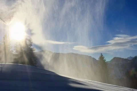 Snow Cannon Making Artificial Snow on Ski Slope in French Alps Stock Photos