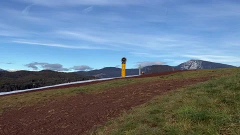 Snow cannon in the snowless mountains Video stock 232048748