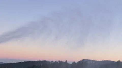 Snow cannon working against evening sky backdrop Stock Footage 58850822