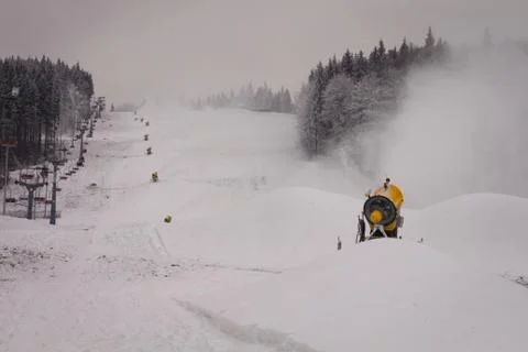 Snow cannons on the slope Foto stock