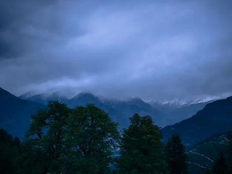 Snow Caped Mountains in the clouds. Stock-Fotos