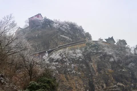 The snow-capped ancient architectural complex of Wudang Mountain. Stock Photos
