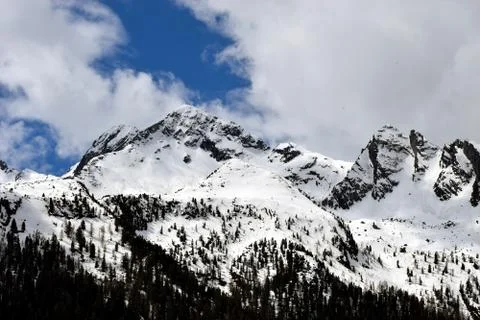 Snow capped mountain peak Stock Photos