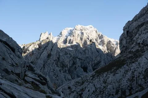 Snow-Capped Mountain Peak in Rugged Terrain Stock Photos