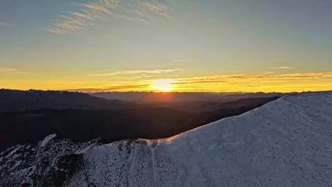 Snow Capped Mountain Peak Under Golden Sunset in Tibet 4K 스톡 동영상 347138541