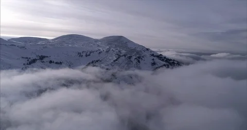 Snow-capped mountain peaks and clouds Stock Footage 119161502