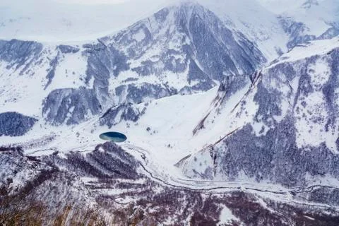 Snow-capped mountain peaks and deep gorges in the area of cross pass, Georgia Stock Photos