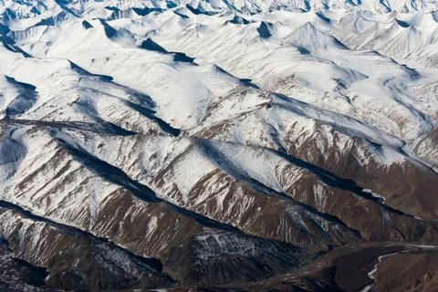 Snow capped mountain range Stock Photos