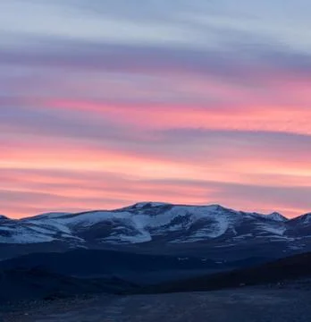 Snow-capped mountain ranges Stock Photos