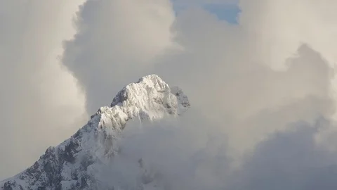 Snow capped mountain top timelapse Stock Footage 81097524