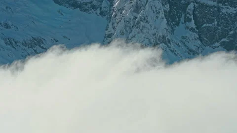 Snow capped mountains above the clouds, Caucasus mountains Stock Footage 138035325