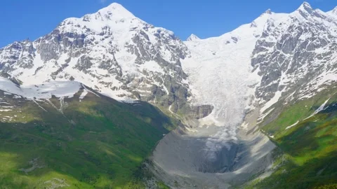 Snow-capped mountains and glacial landscapes of the Caucasus Mountains Stock Footage 314632869