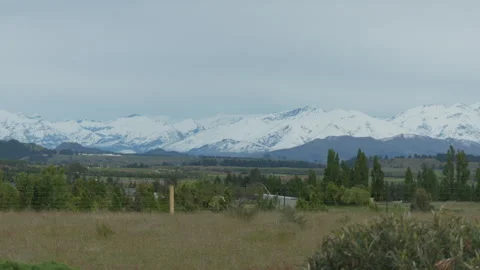 Snow-capped mountains and green valley in New Zealand, natural landscape Stock Footage 341851348