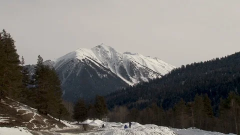 Snow-capped mountains and mountain peaks. Common plan. Stock Footage 106857362
