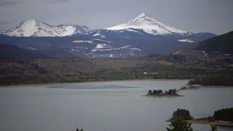 Snow-capped mountains in the background of a mountain lake in Utah, nature US Stock Footage 142721093