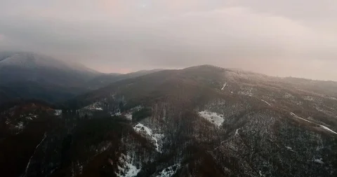 Snow-capped mountains gorge forest drone Stock Footage 123608809